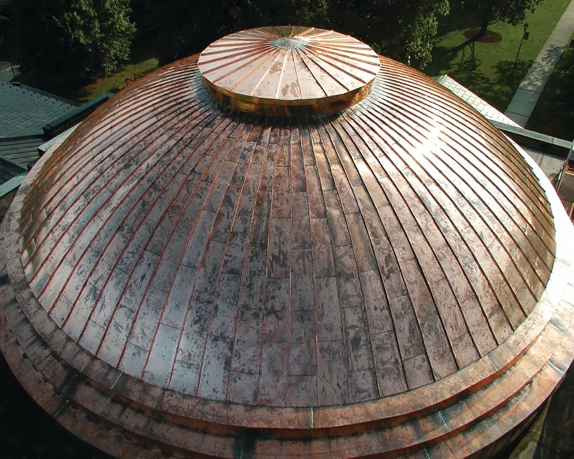 Craftsman Roofing crew installing a new roof in Bartlesville